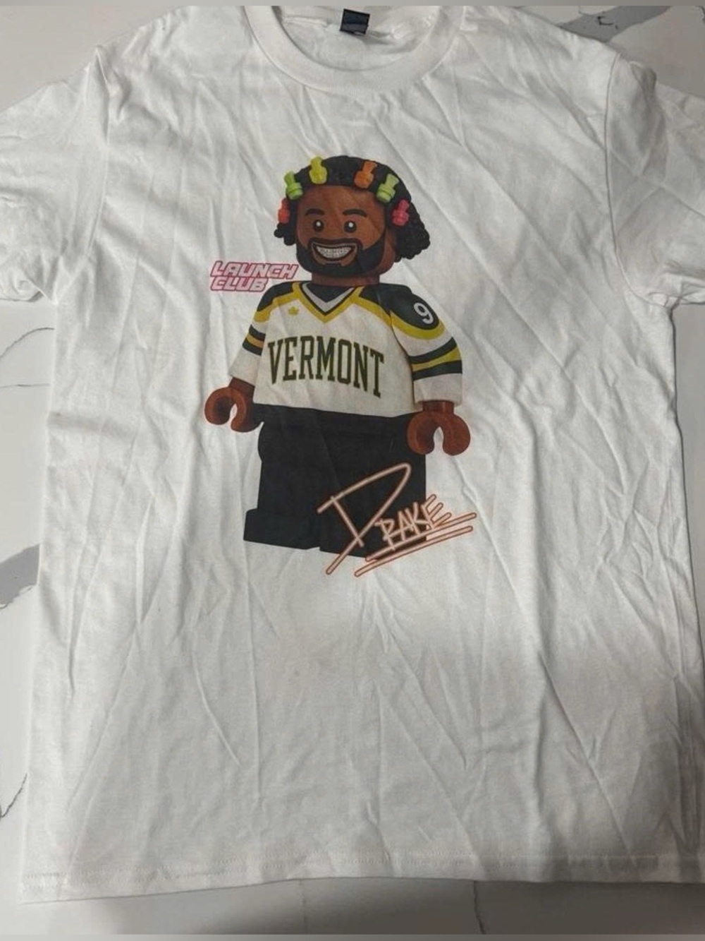 White Graphic T‑Shirt with Vermont Lego Character